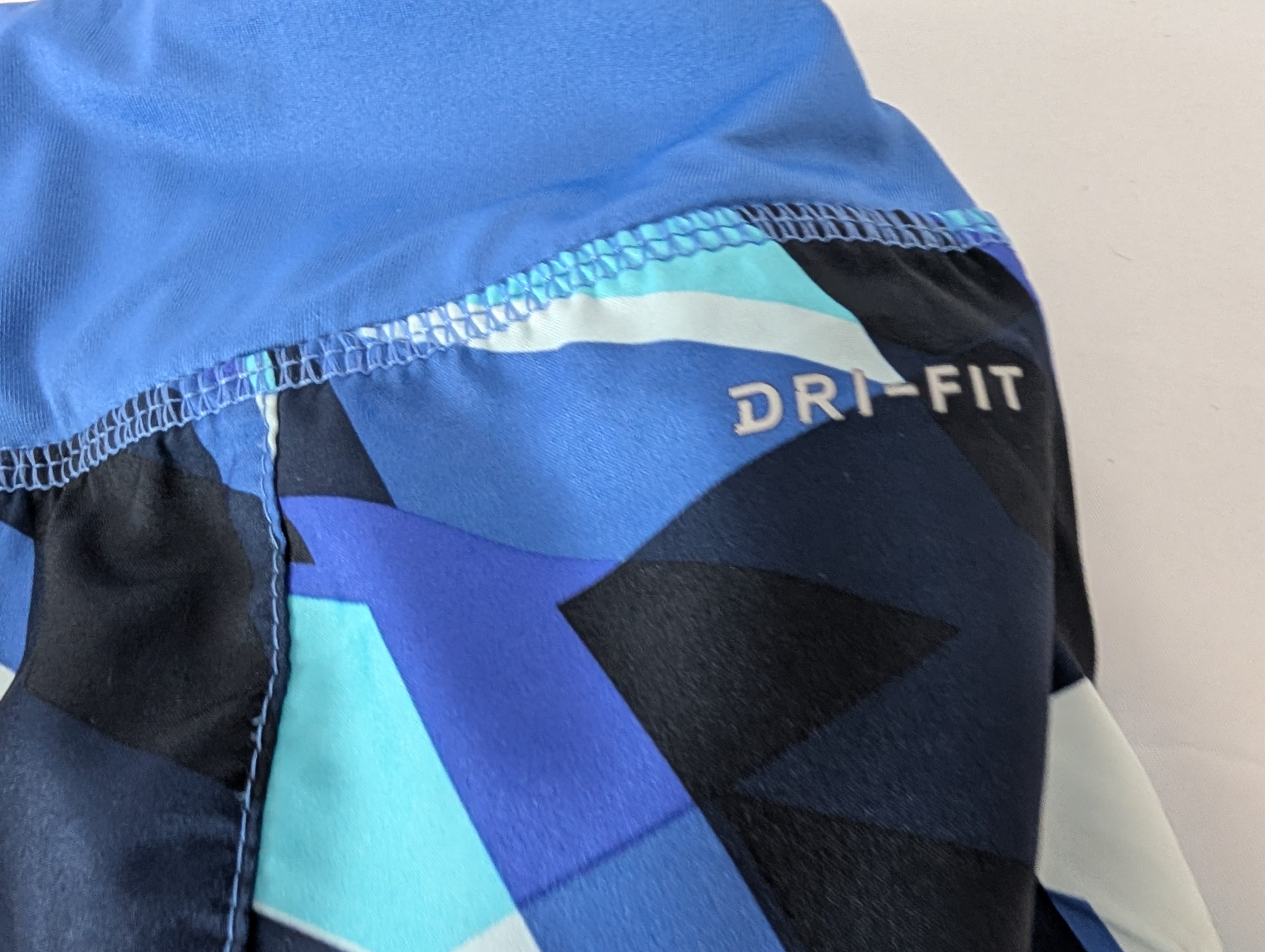 Nike Dri-Fit running shorts, Geometric Blue shades, Size Medium